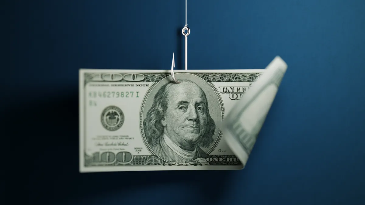 $100 dollar bill on a fishing hook