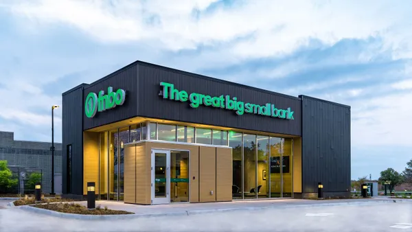 A building shows the words "fnbo" on one side and "The great big small bank" on the other side.