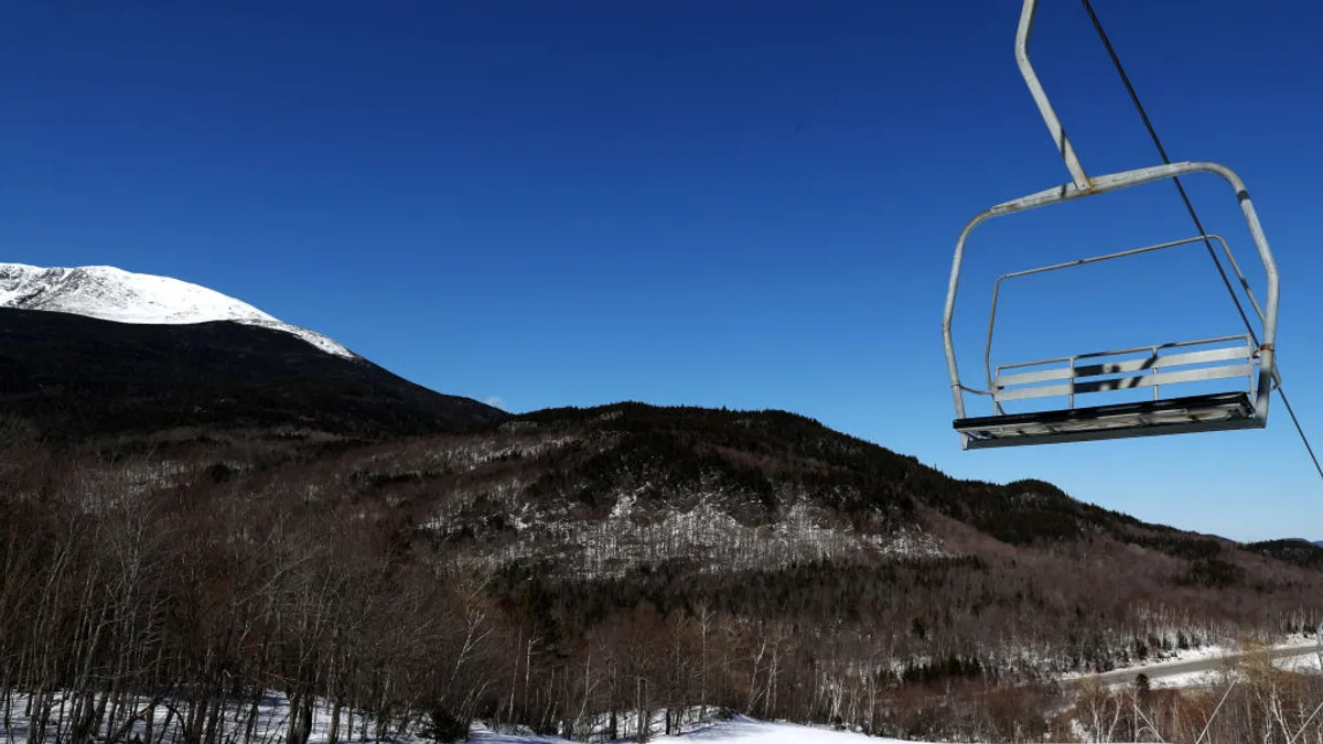 An empty Vail Resorts ski lift