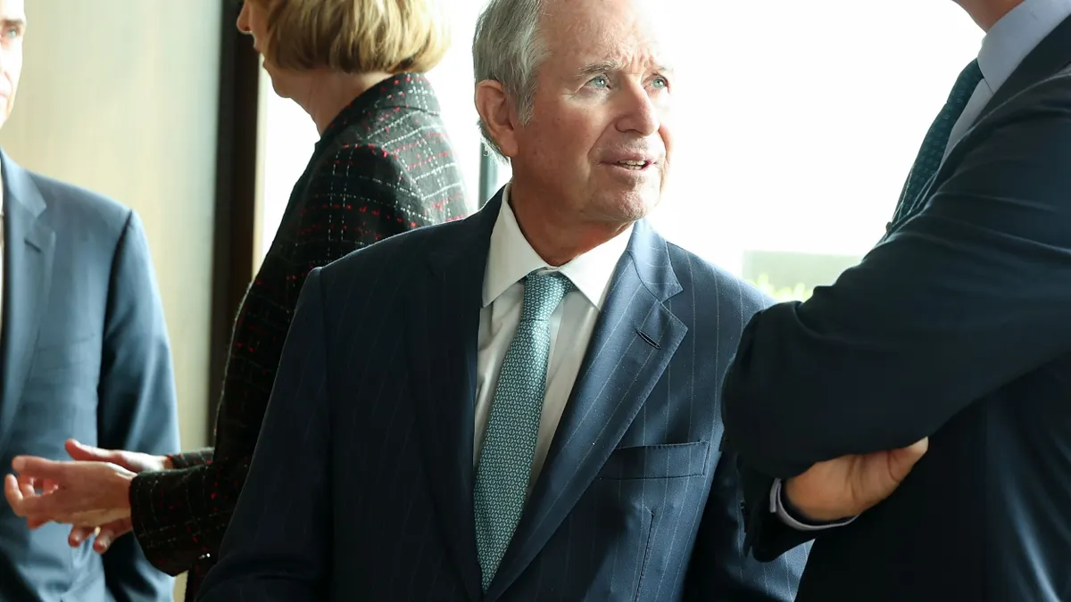 A person wearing a suit