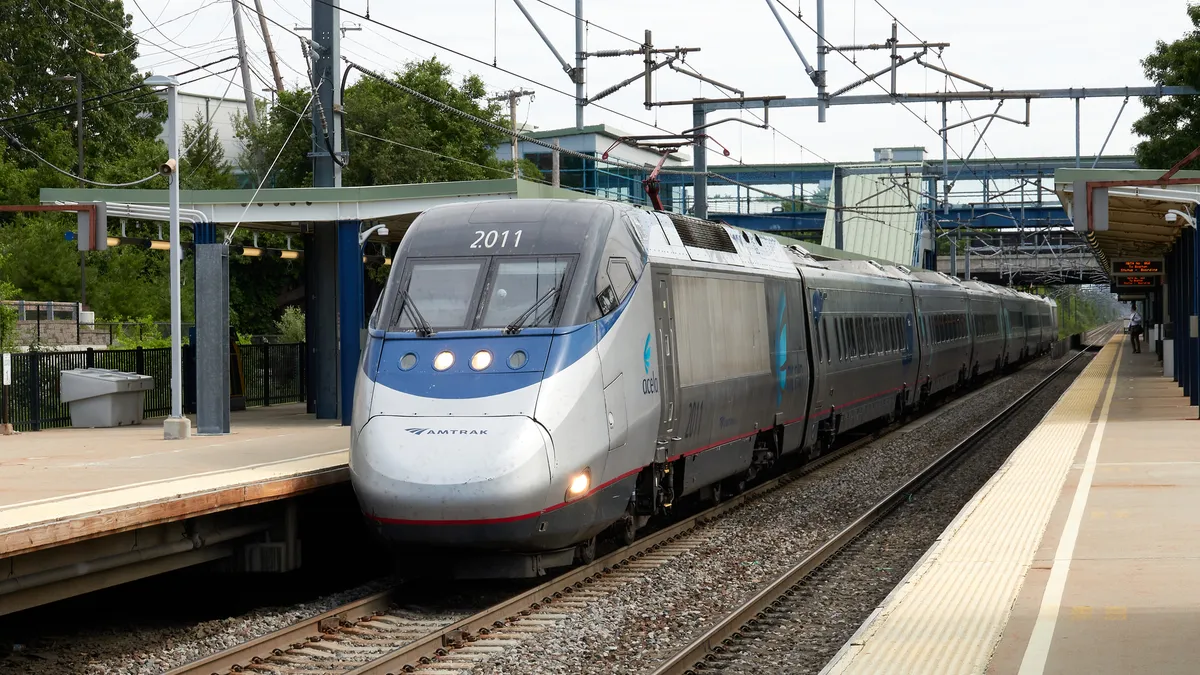 An Amtrak Acela train stops at the Route 128 station in Massachusetts.