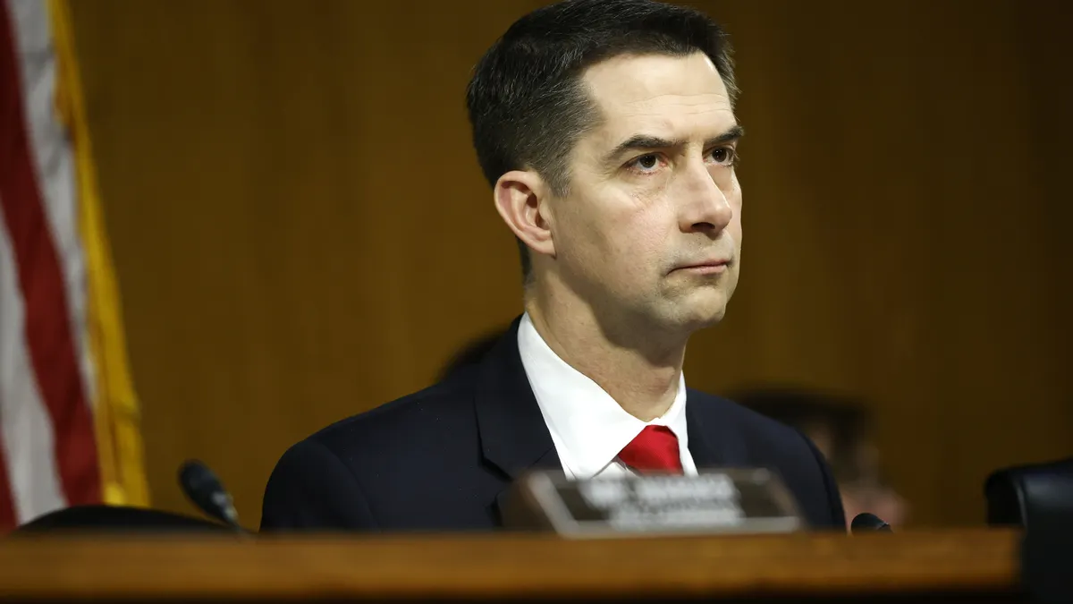 Senator Tom Cotton stares sternly into the distance