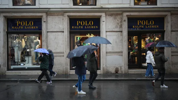 Shoppers walk past the U.S.-owned Polo Ralph Lauren store in the upmarket Via del Corso shopping area on March 12, 2025 in Rome, Italy.