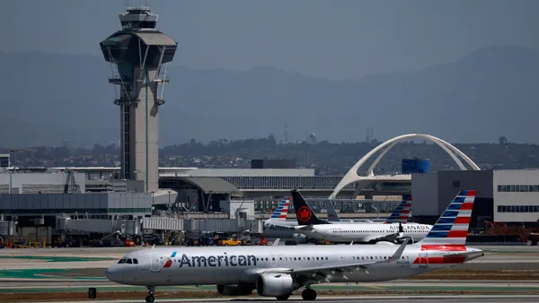 An American Airlines plane taxis at Los Angeles International Airport