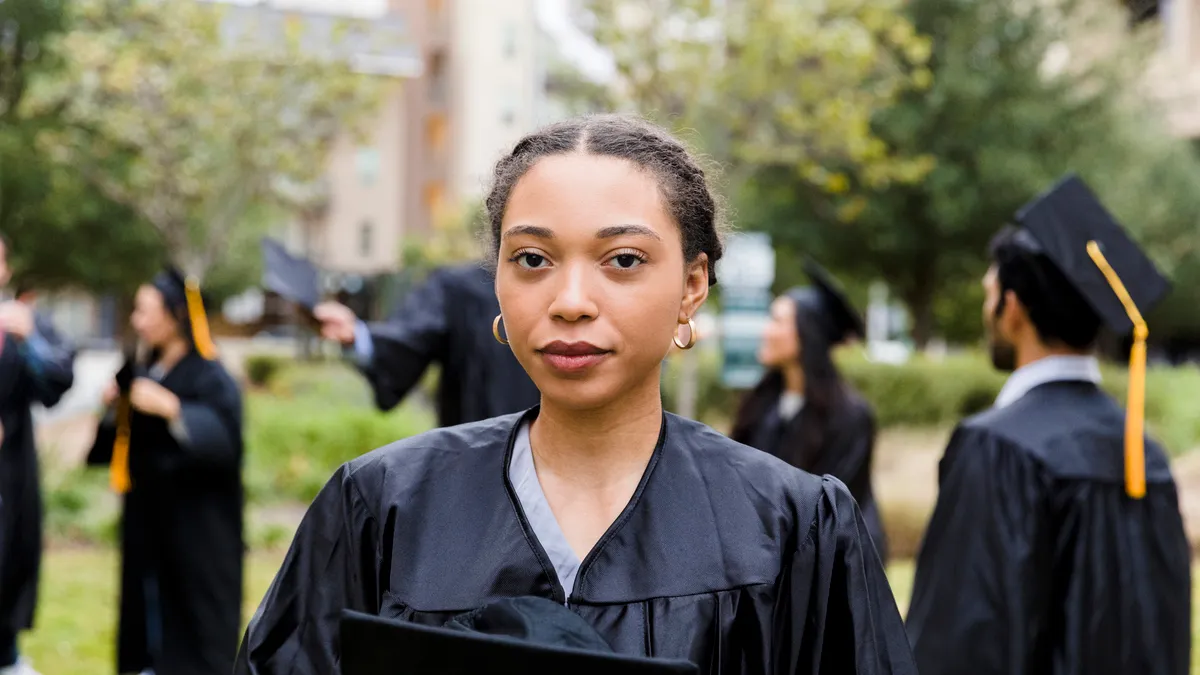 Portrait of a serious person on college graduation day