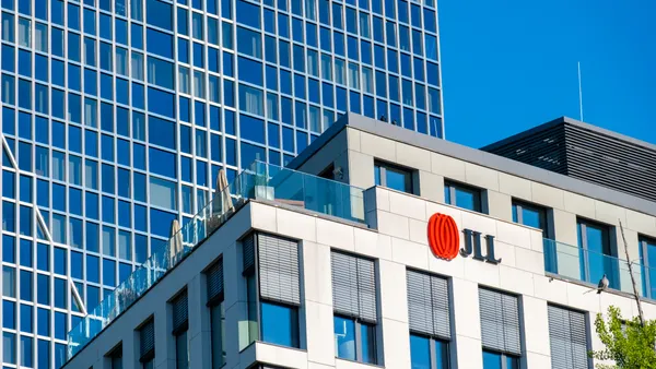 JLL logo atop a building.