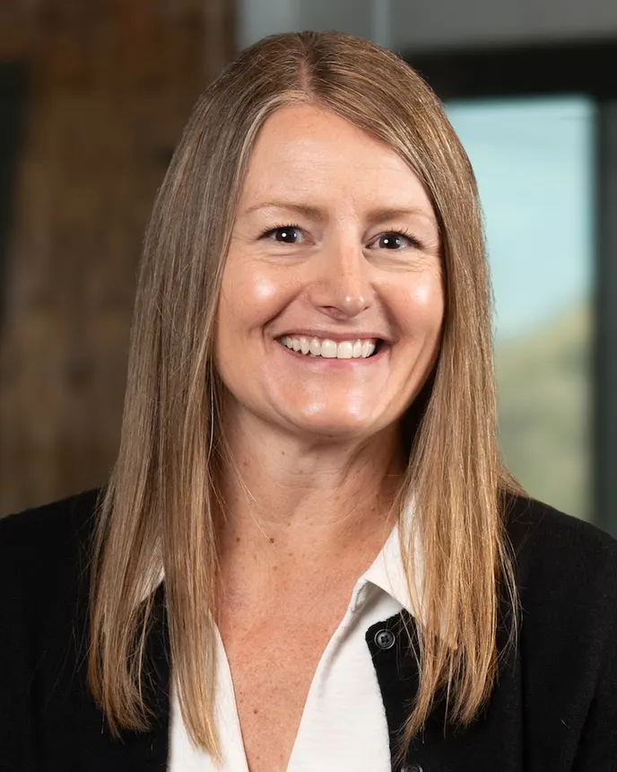 A headshot of Kristi Rader