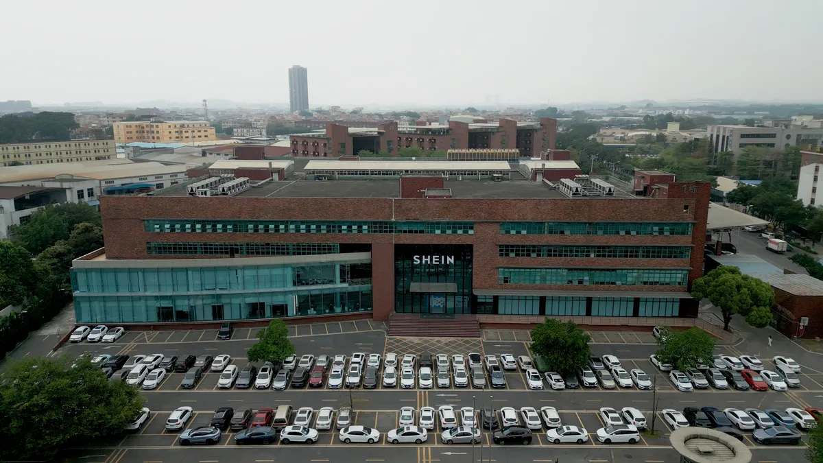 An aerial view of a Shein building with its parking lot.