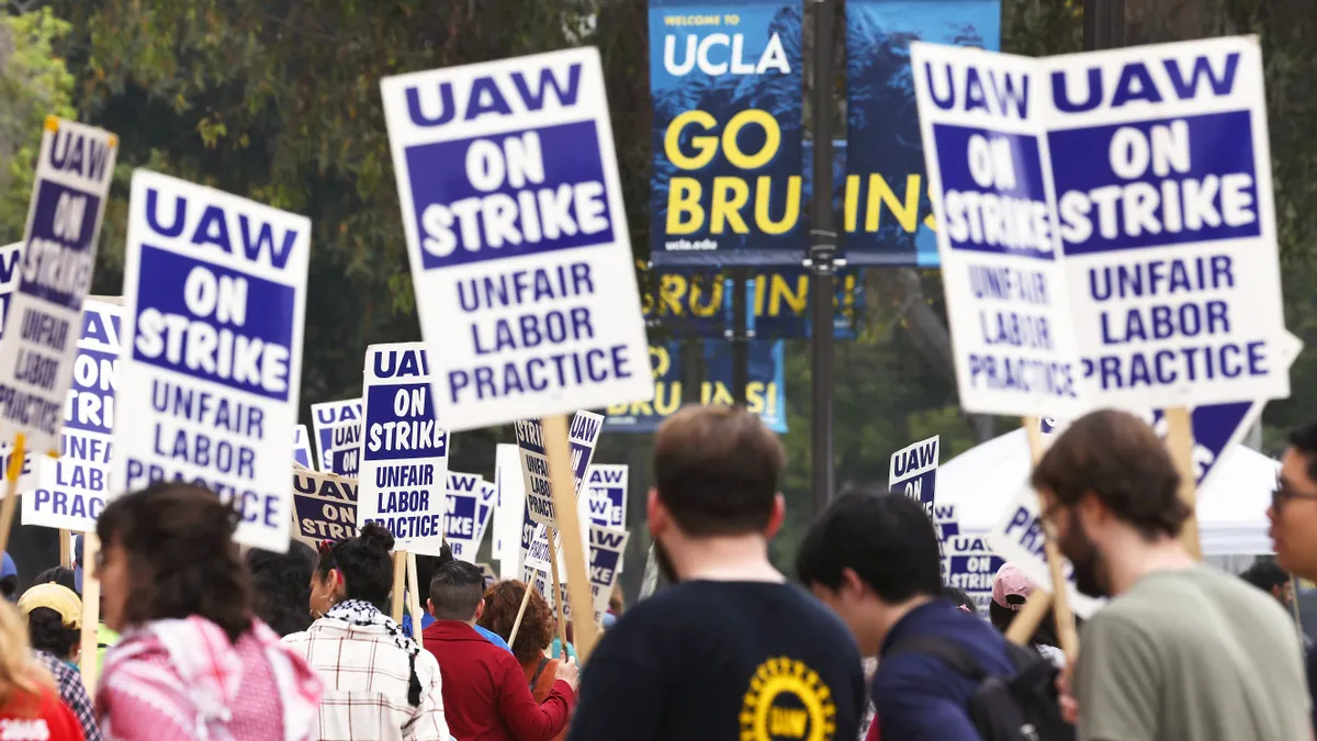 A large crowd of people strike over the police response to pro-Palestinian campus protests.