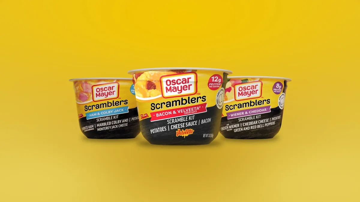 Three Oscar Mayer Scramblers against a yellow background.