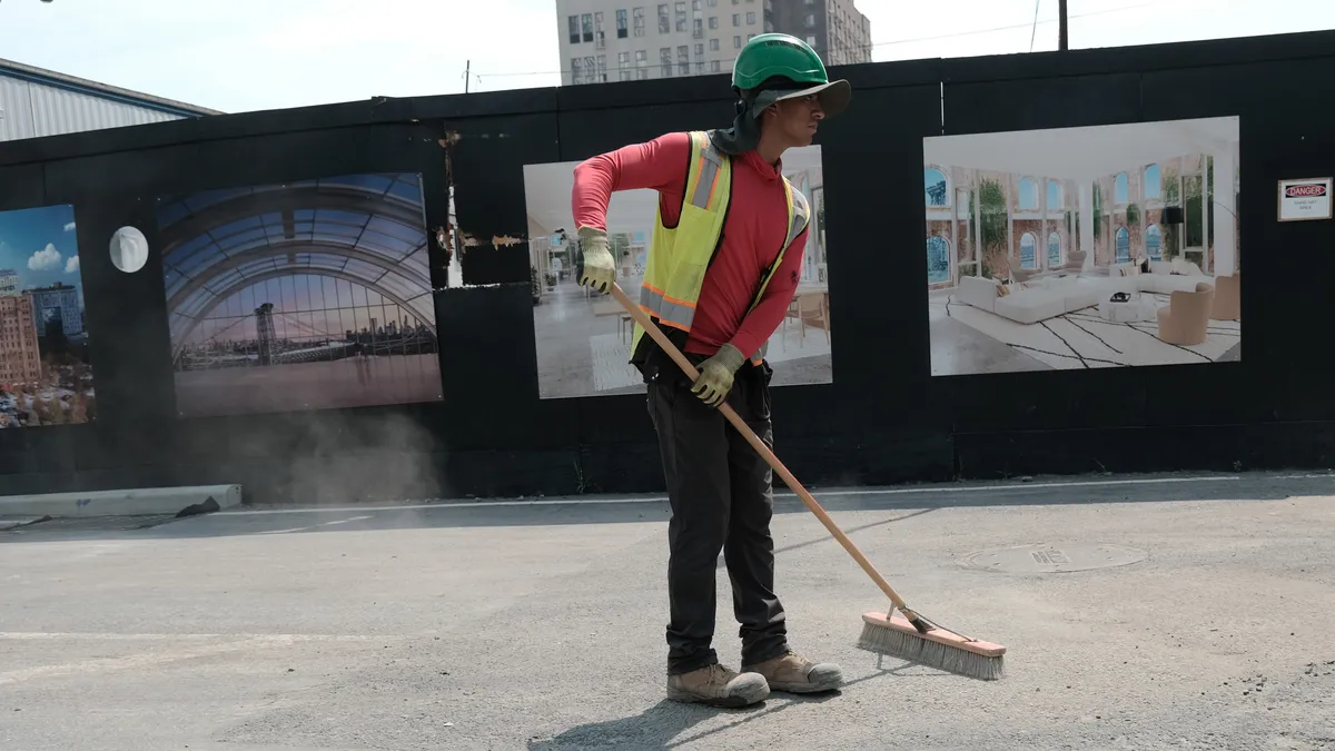 A man works in the sun at a construction site during a heat wave on July 27, 2023 in the Brooklyn borough of New York City.