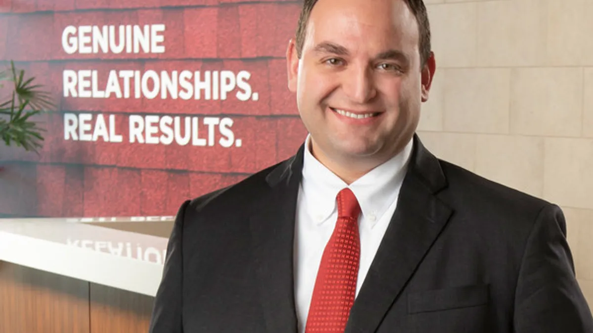 A headshot of outgoing Red Roof President George Limbert.