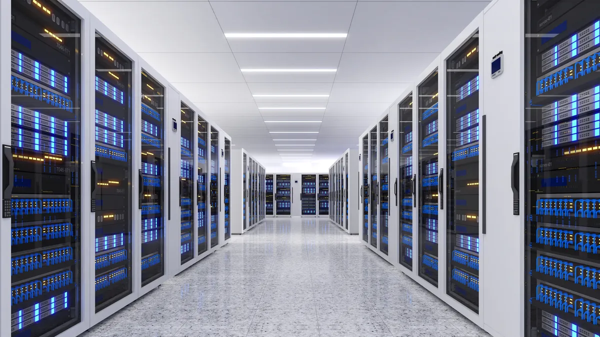 Shot of Data Center With Multiple Rows of Fully Operational Server Racks.