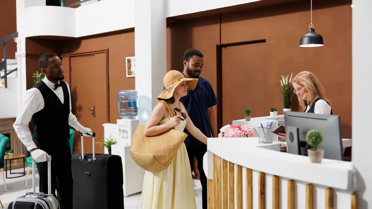 Guests checking in a hotel