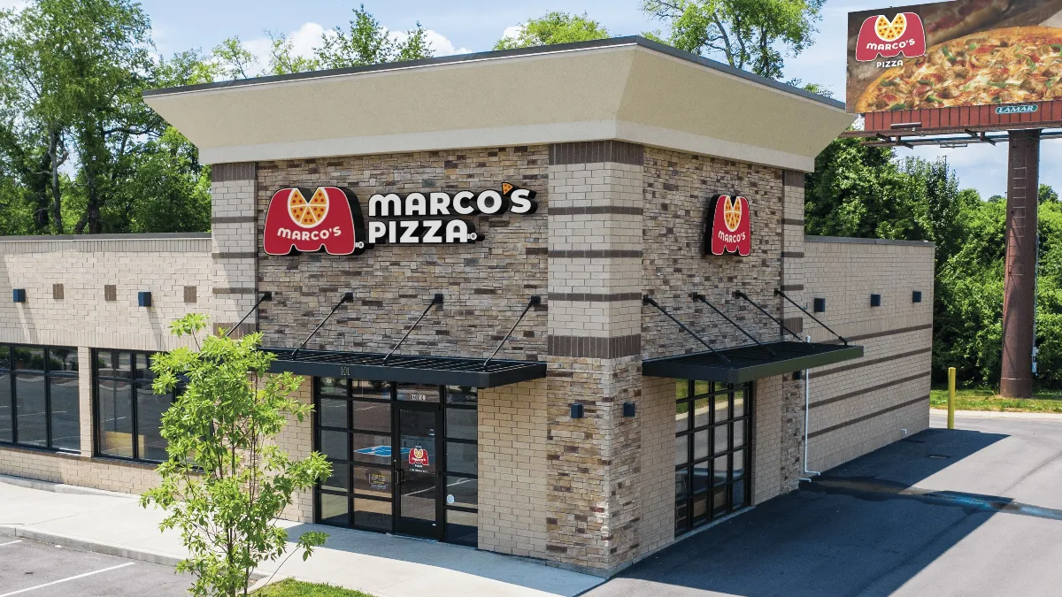 An image of a building with the words Marco's Pizza on the side.