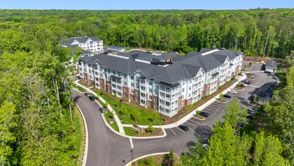Aerial view of garden apartment property.