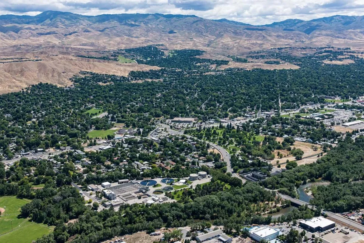 Aerial view of Boise water infrastructure, with mountains in the background.