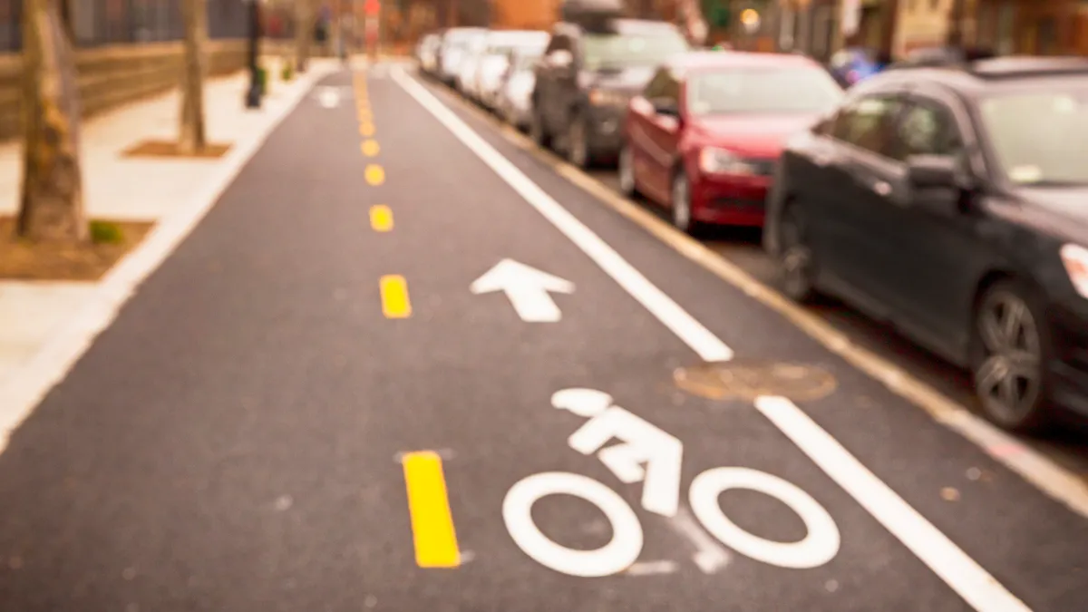 A protected bike lane in a city.