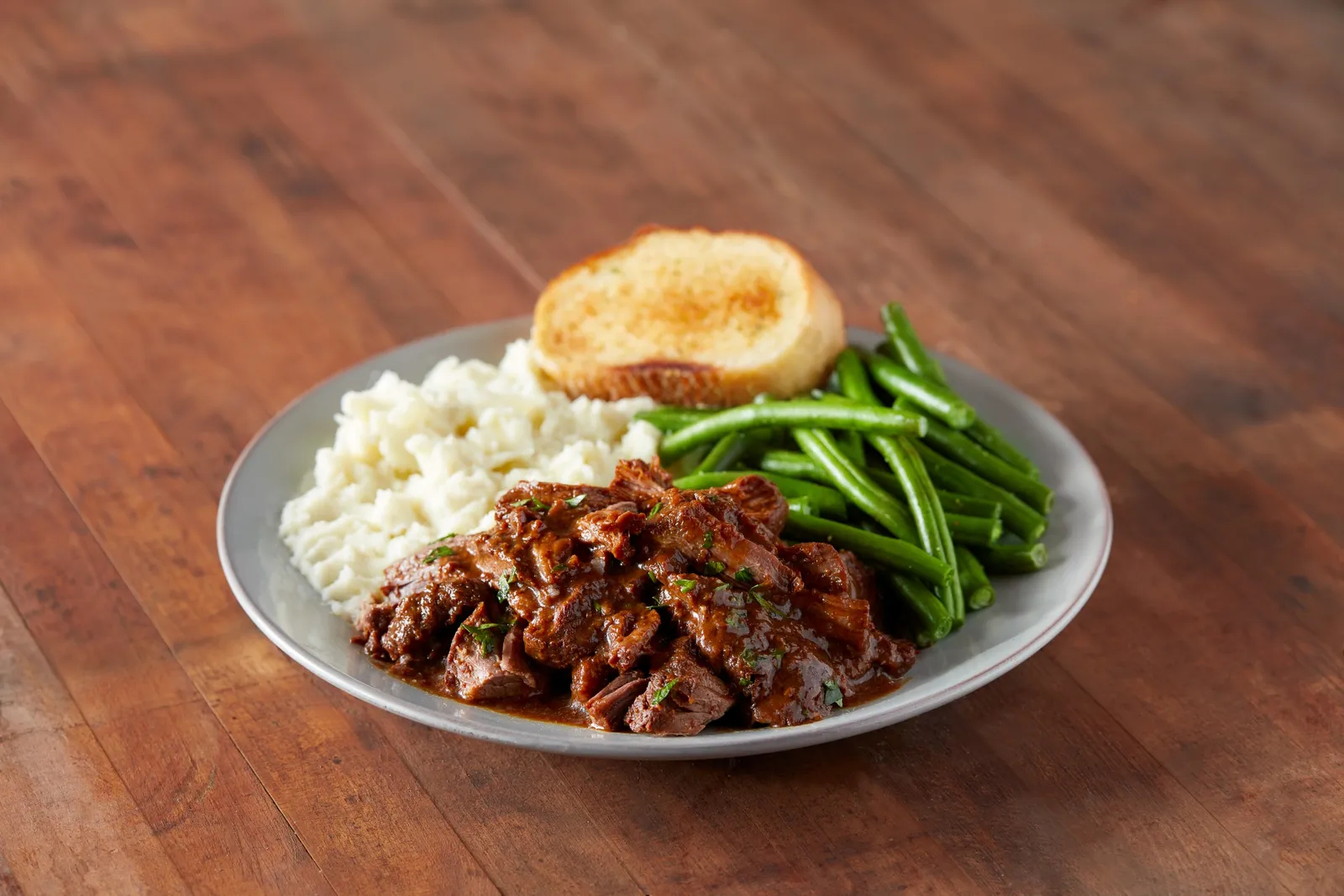 A photo of pot roast from Travel Center's of America's dinner menu.