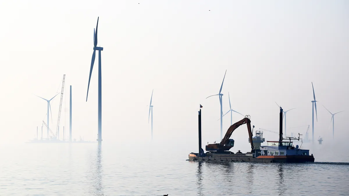 Construction of new wind turbines at the Ijsselmeer, Breezanddijk, Holland.