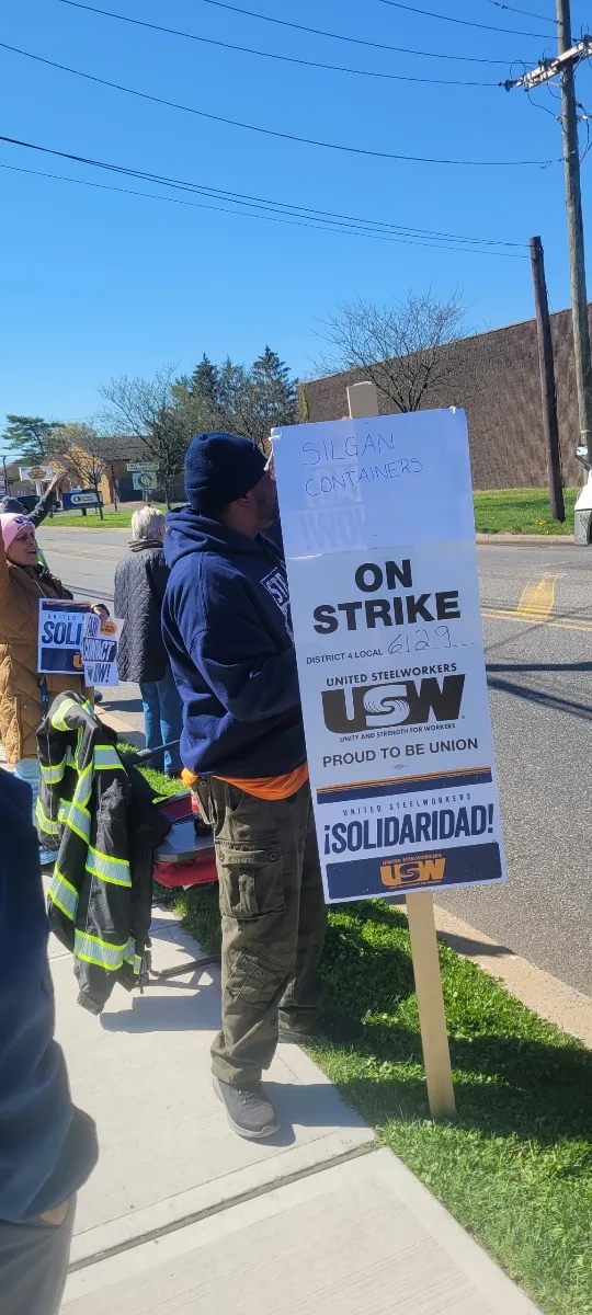 A worker stands striking at Silgan Containers