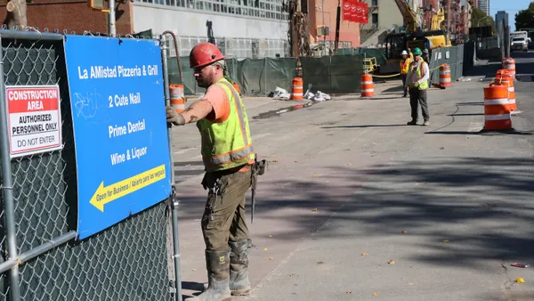 Workers are seen on the construction site of the Second Avenue Subway station