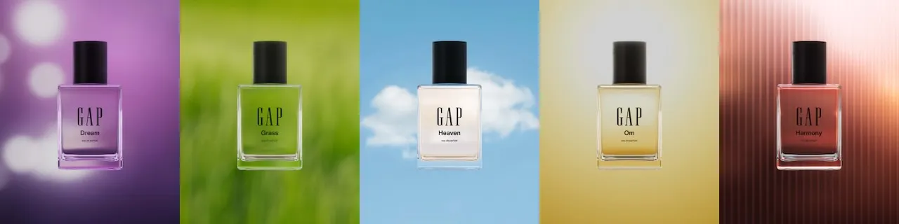 A row of perfume bottles in different colors.