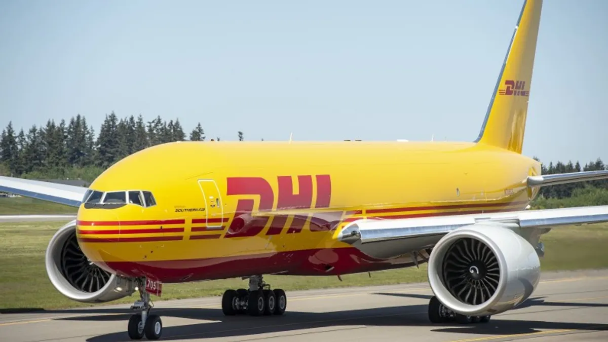 DHL is adding more Boeing 777 Freighters to its fleet, which Boeing says are more fuel-efficient than older aircraft.