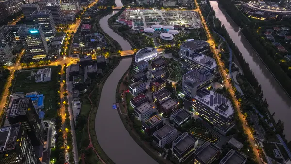 An aerial photo at night of Zhangjiang Hi-Tech Park, an industrial park in Shanghai that is home to multiple life sciences and tech companies.