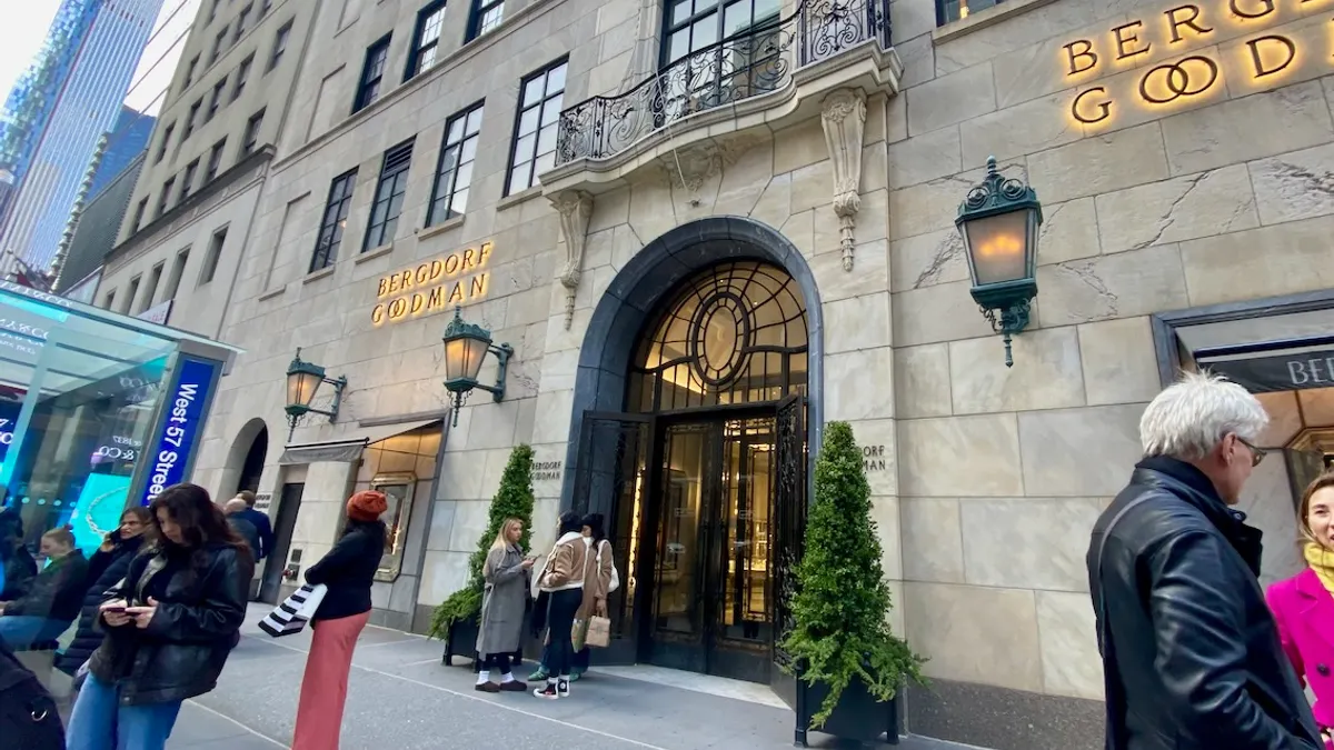 People in the city gathered around a department store entrance.