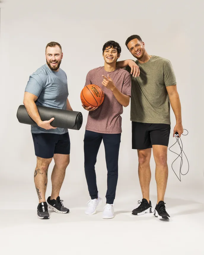 Three people wearing items from True Classic&#x27;s activewear collection.