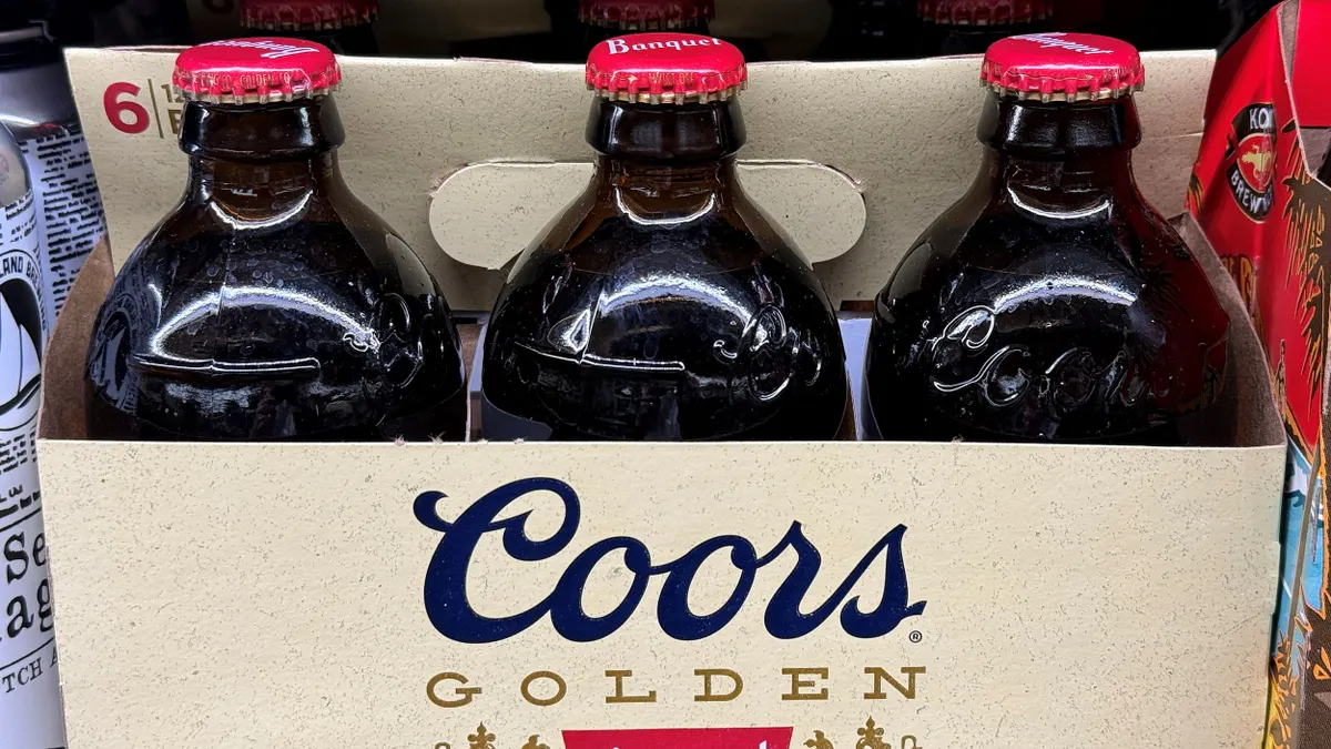 a closeup of a six-pack of Coors Banquet beer.