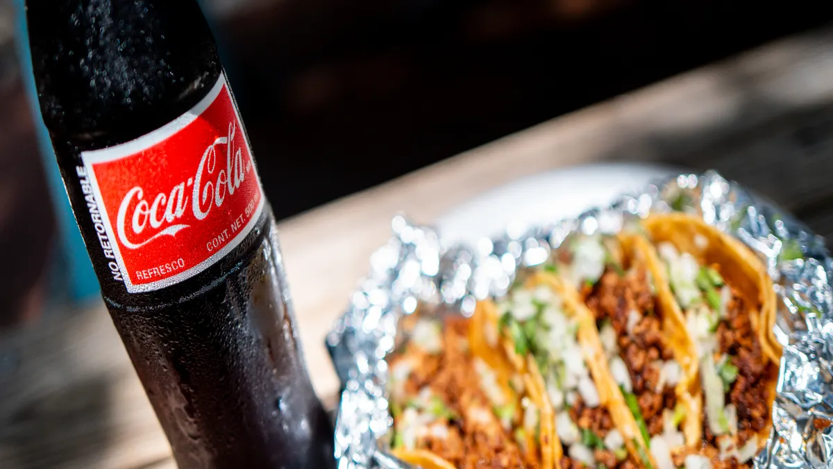 A bottle of Coca-Cola.