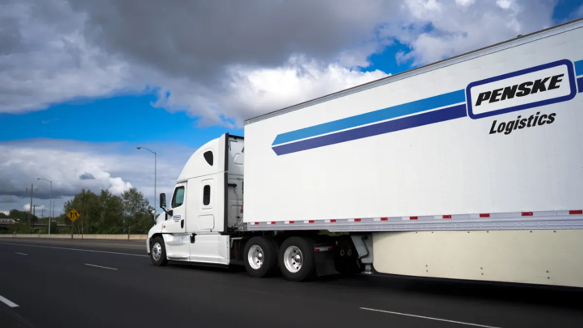 A Penske Logistics tractor-trailer on the road.