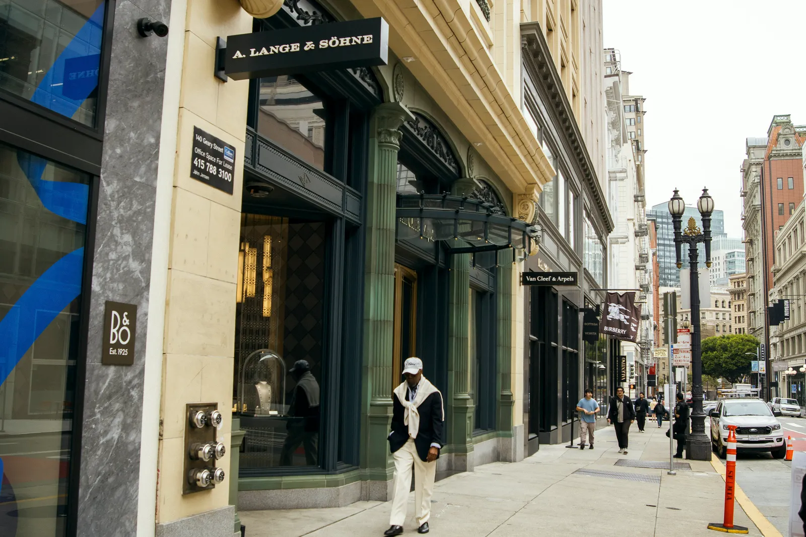 People walking down a city street.