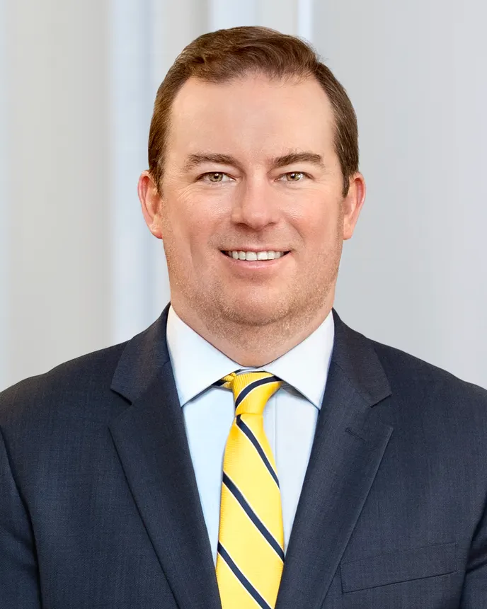 A headshot of Matthew Madden