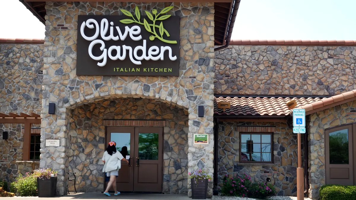 The exterior of an Olive Garden restaurant