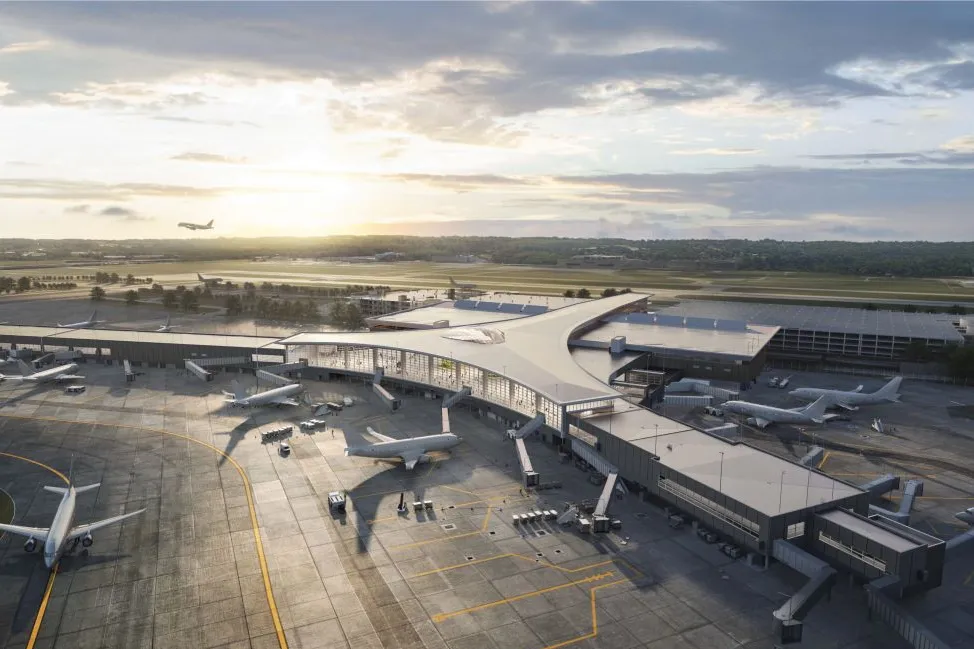 The rendering shows an aerial view of the improvements at Columbus Airport.