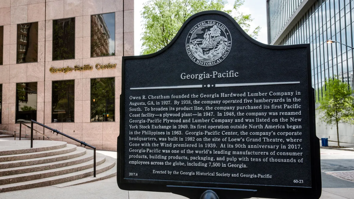 A historical marker gives background on the Georgia-Pacific Center, the corporate headquarters for Georgia-Pacific.