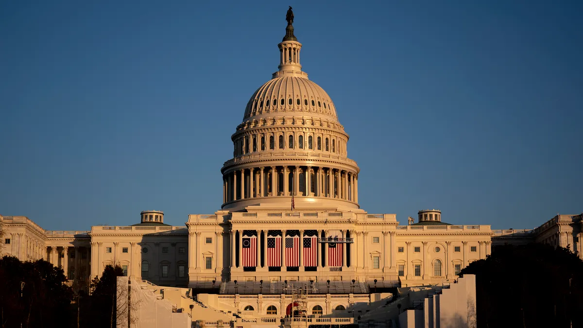 The capitol building from the front at golden hour.