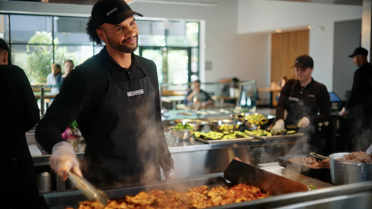 A Chipotle Mexican Grill employee.