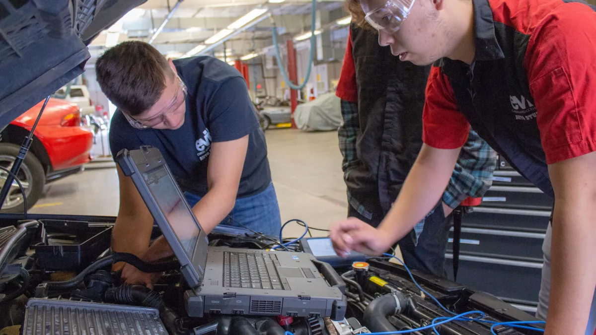 A student and educator work together in an automotive career and technical education course at East Valley Institute of Technology in Mesa, Arizona.