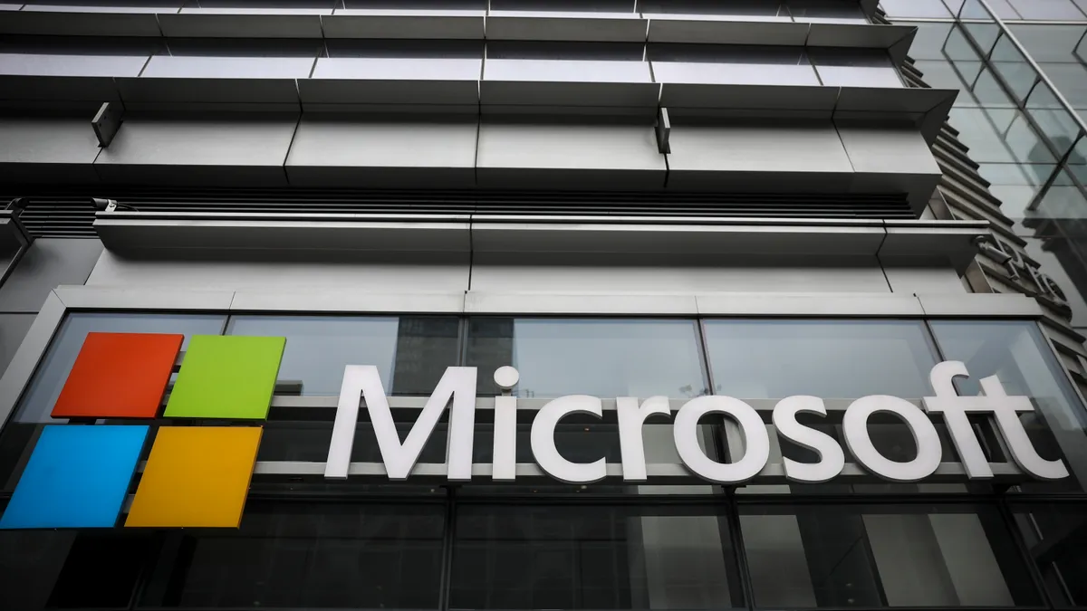 The Microsoft logo is displayed outside the Microsoft Technology Center near Times Square.