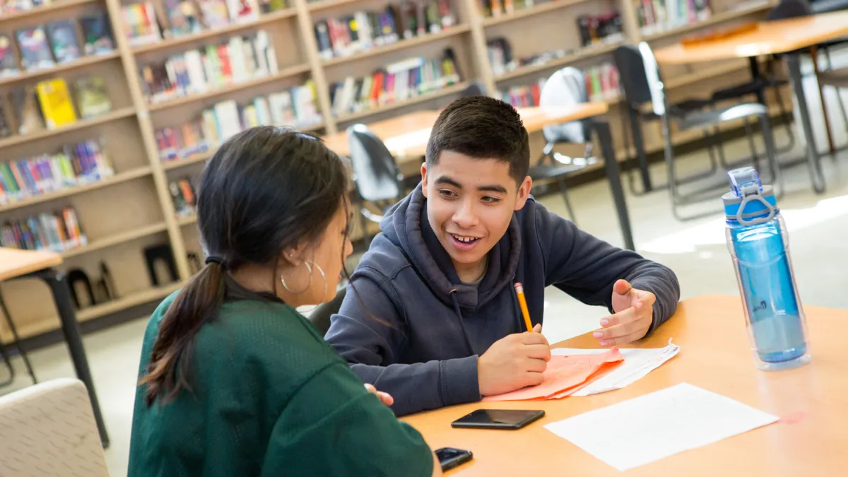 Two students working after school.