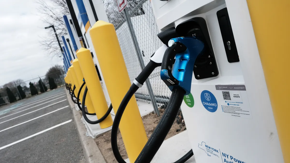 A fast-charging station for electric vehicles stands in the cell phone lot at John F. Kennedy airport in New York City.