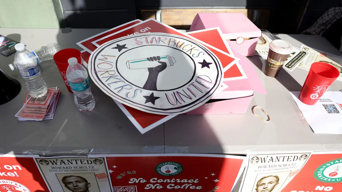 A table set with strike materials for Starbucks Workers United's Nov. 17 national strike.