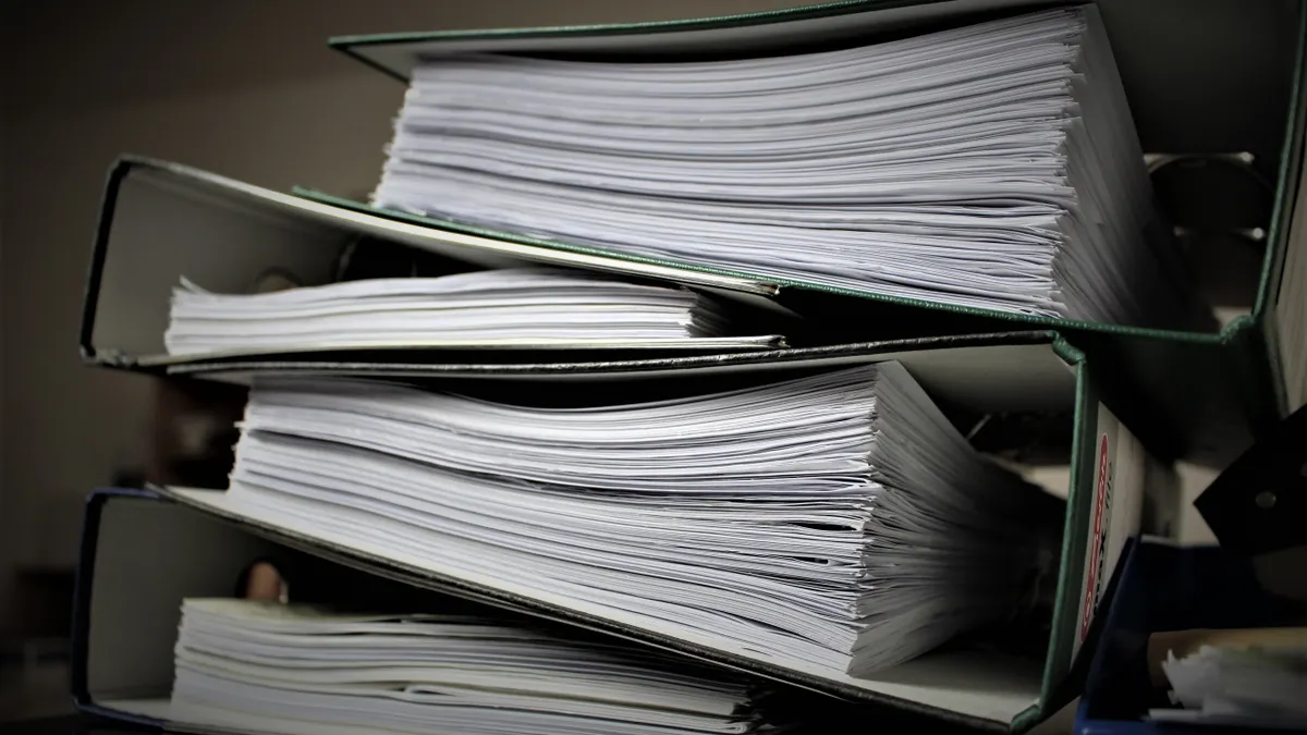 stack of books and papers
