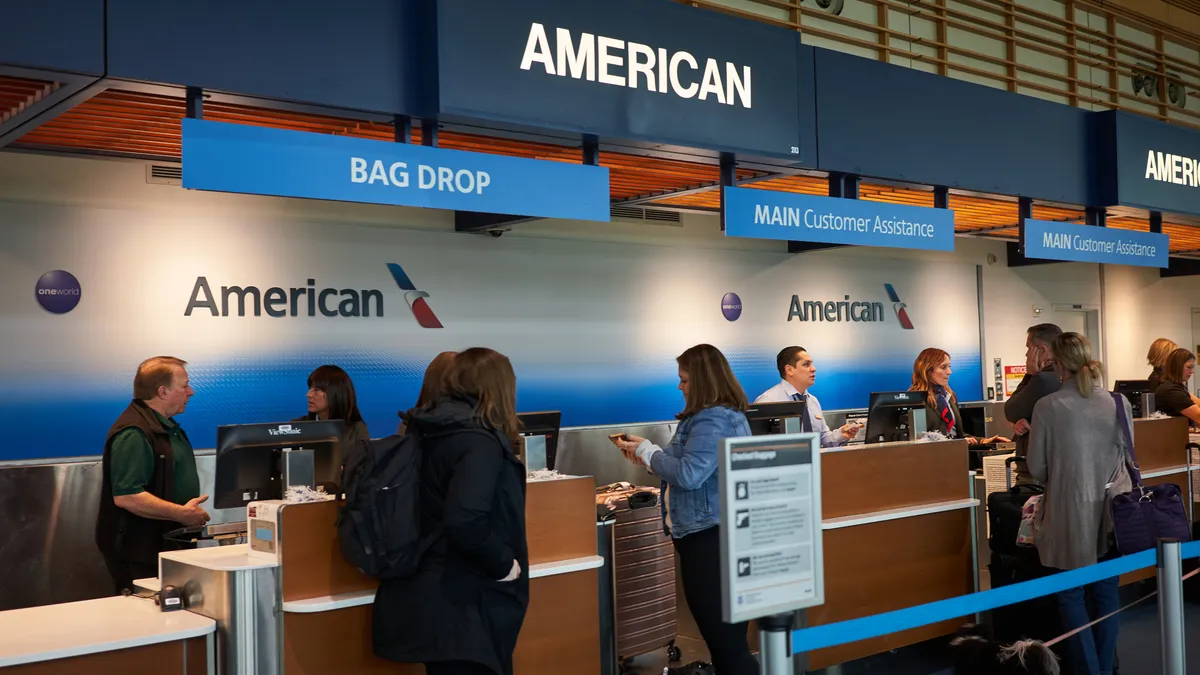 The American Airlines check-in desk in Portland International Airport.