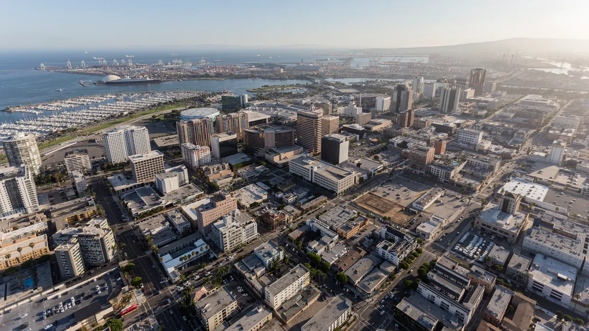 Aerial view of downtown Long Beach, California, with ocean in the background