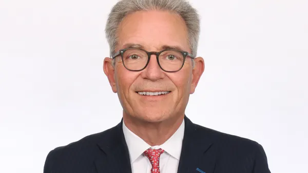 A headshot of Liam Brown